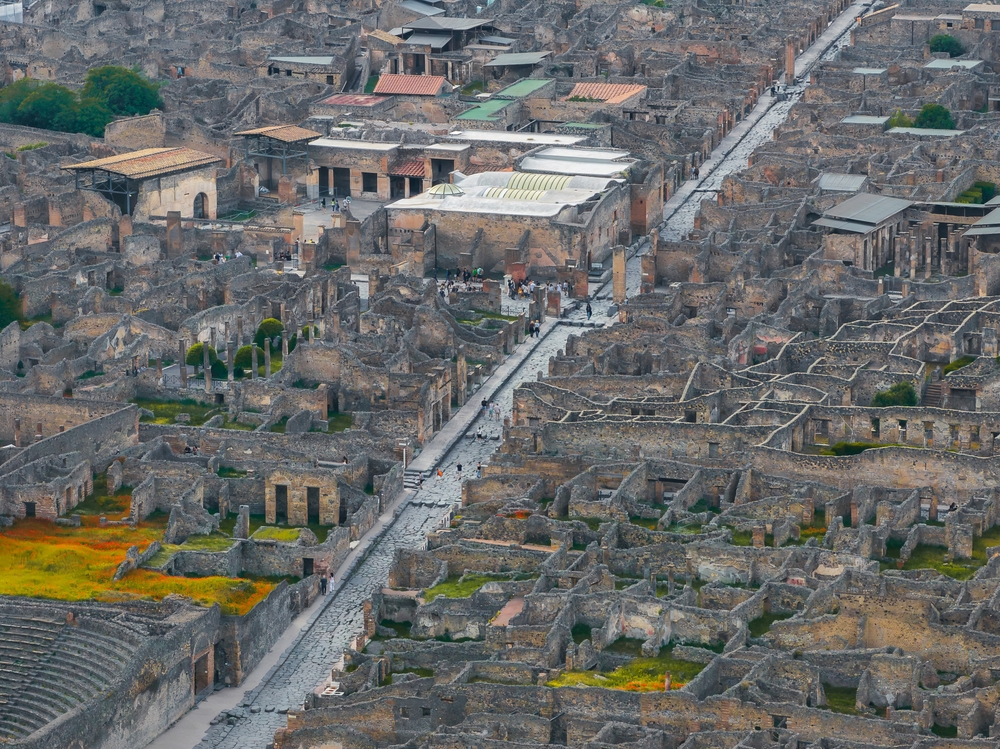 Aerial view of Pompeii showing the grid layout of the ancient city — use this to plan your visit
